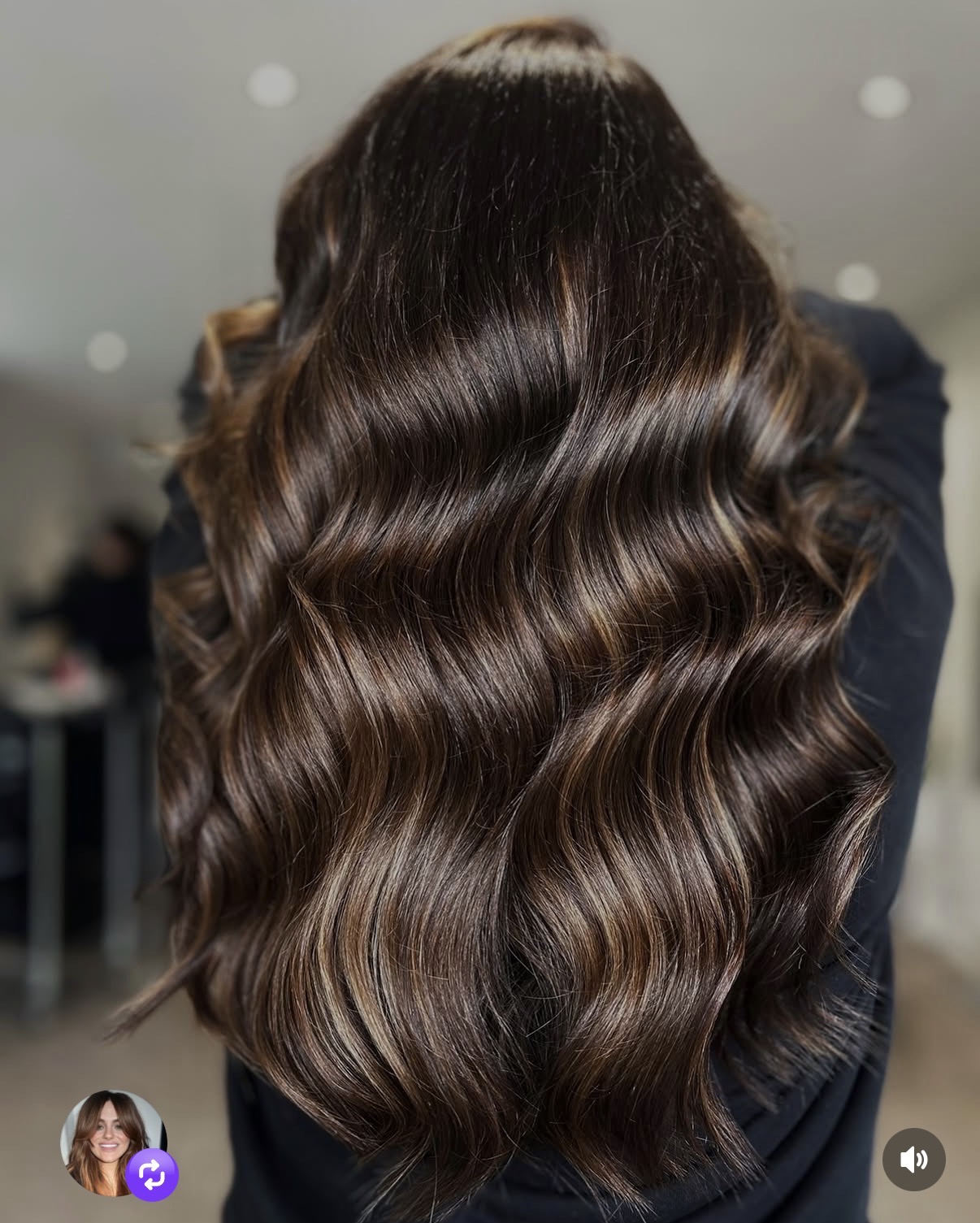 Glossy brunette colour result with soft waves